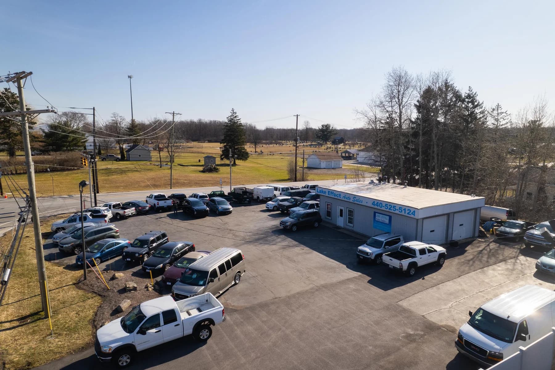 Lake Effect Auto Sales dealership and vehicle inventory photographed from above in Chardon, Ohio